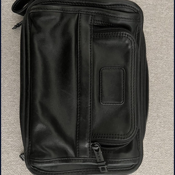Tumi leather hand bag